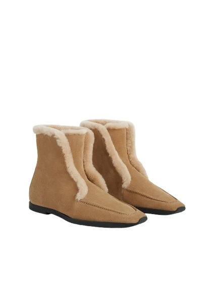 Toteme-Shearling-edge-winter-boots-caramelecru-541535_nobg Toteme Boots luxury Boots from Luxury Handbags Marketplace