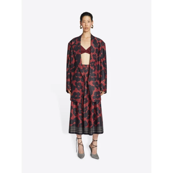 with abstract floral print and contrast striped border.
