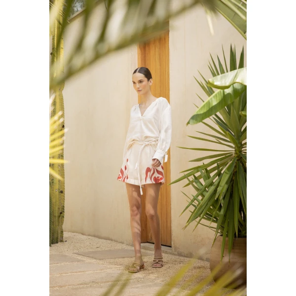Andres Otalora luxury designer Top with bold silhouette in linen