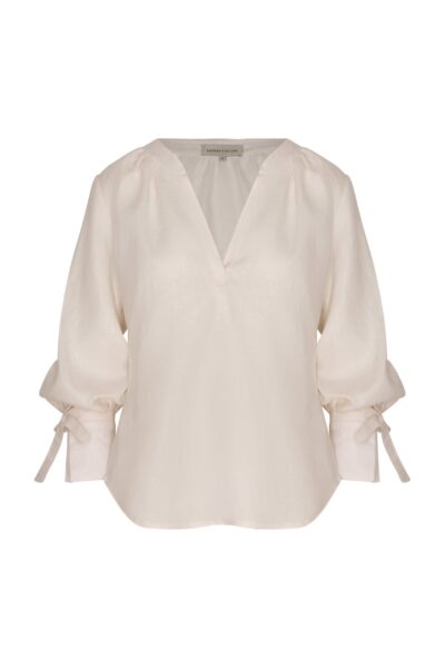 Andres Otalora luxury designer Top with bold silhouette in linen