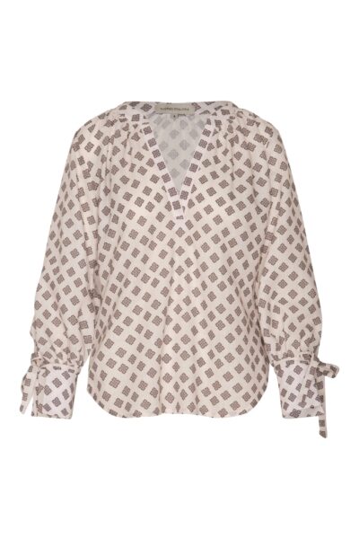 Andres Otalora luxury designer Top with bold silhouette in linen