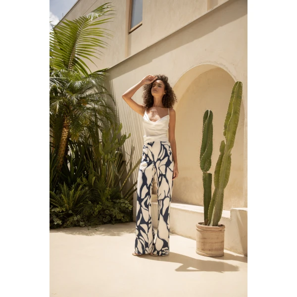 Andres Otalora luxury designer Top with bold silhouette in linen