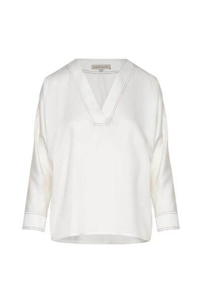 Andres Otalora luxury designer Top with bold silhouette in linen