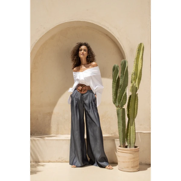 Andres Otalora luxury designer Top with bold silhouette in linen