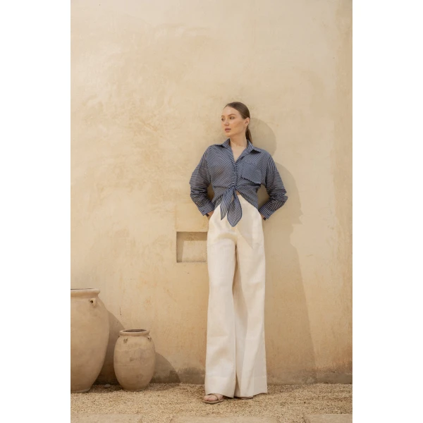 Andres Otalora luxury designer Top with bold silhouette in linen