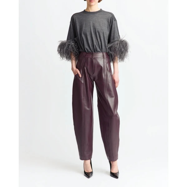 designed with a slight balloon fit that adds soft structure through the leg.