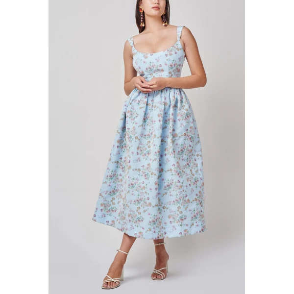 Markarian dresses with romantic neckline and structured silhouette