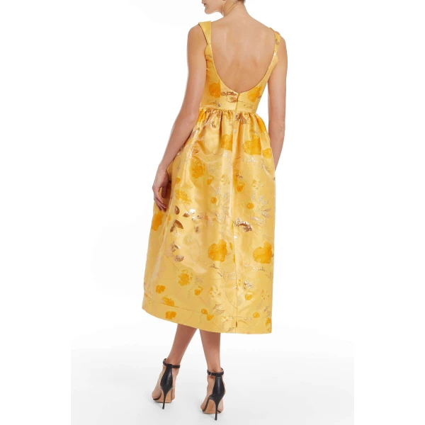 Markarian gowns with romantic neckline and structured silhouette