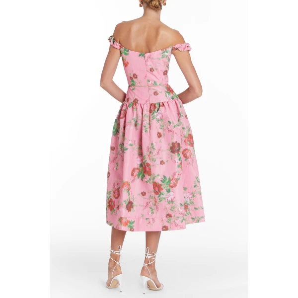 Markarian gowns with romantic neckline and structured silhouette