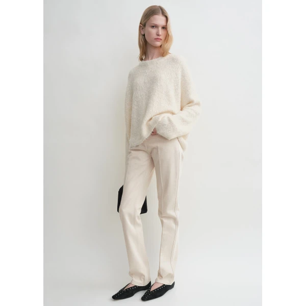 Toteme Knitwear with minimalist design at Luxury Shoes 
