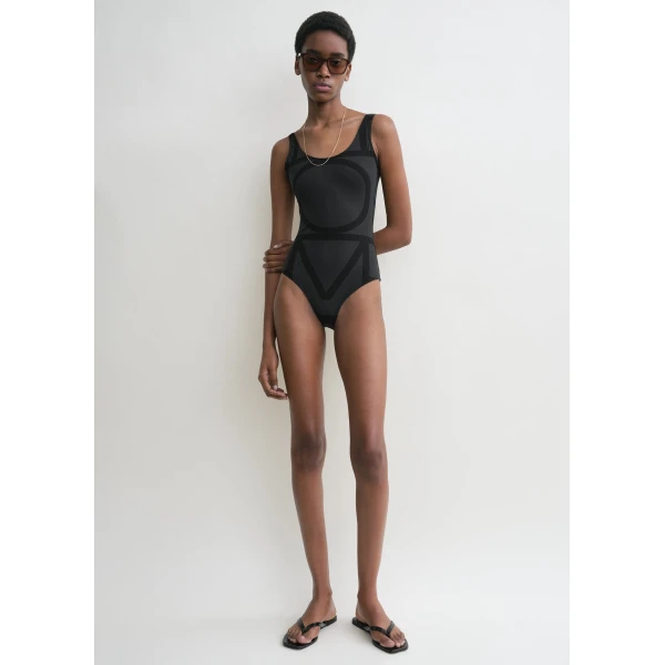 Toteme Beachwear with minimalist design at Luxury Shoes 