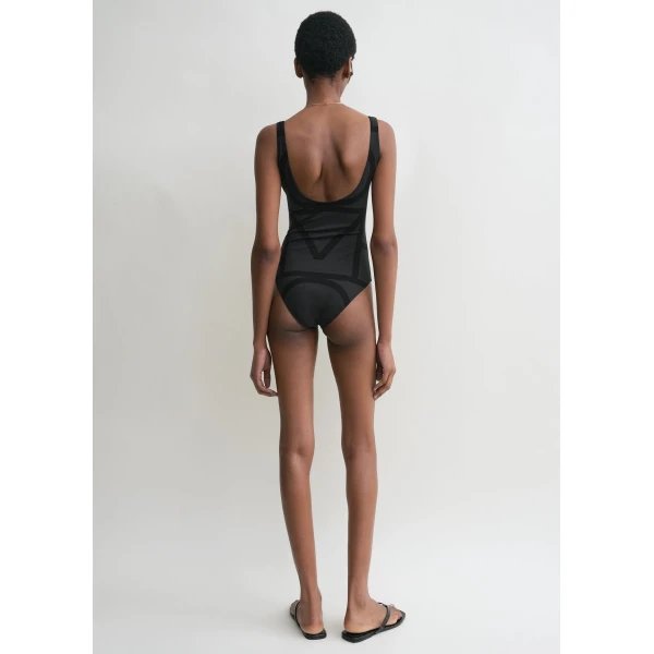 Toteme Beachwear with minimalist design at Luxury Shoes 