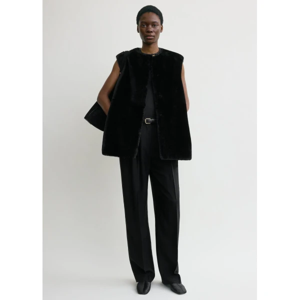 Toteme Coats with minimalist design at Luxury Shoes 