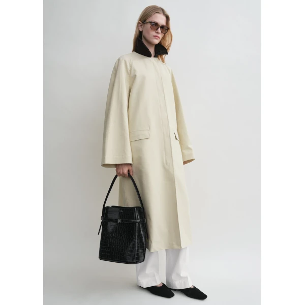 Toteme Coats with minimalist design at Luxury Shoes 