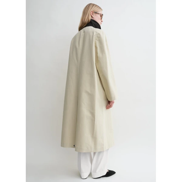 Toteme Coats with minimalist design at Luxury Shoes 