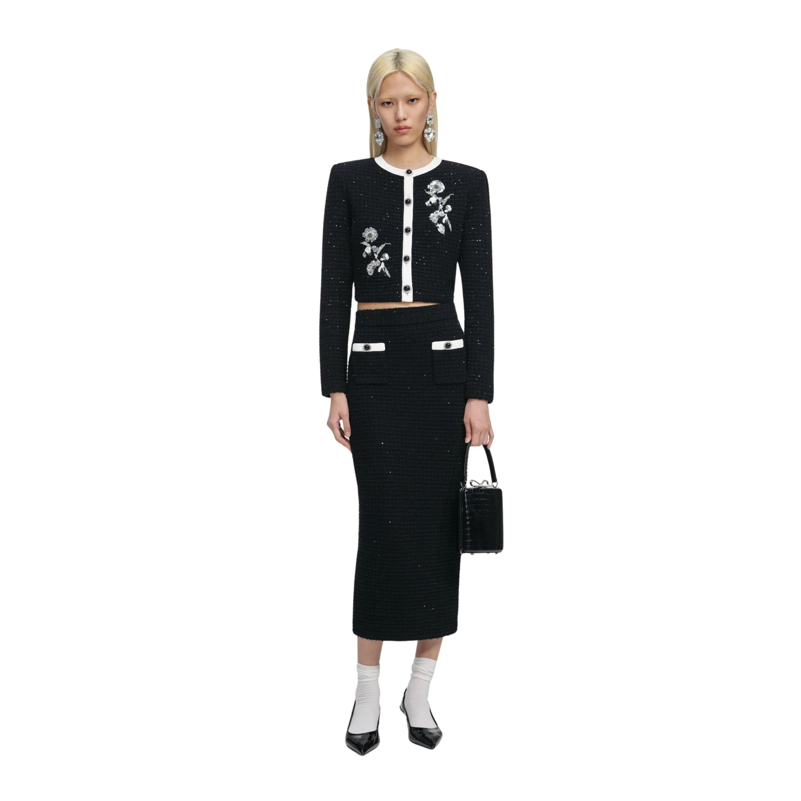 Self-Portrait-Black-Textured-Knit-Midi-Skirt-2025-coveti-5-scaled72516_nobg Self Portrait Skirts luxury Clothing from Luxury Handbags Marketplace