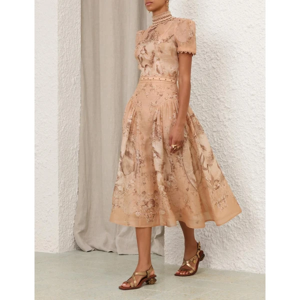 Elevate your elegance in this Zimmermann Tops   from the 2025 resort wear edit