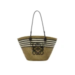 LOEWE-Medium-Anagram-Basket-In-Iraca-Palm-And-Calfskin-2025-coveti-scaled77676_nobg coveti