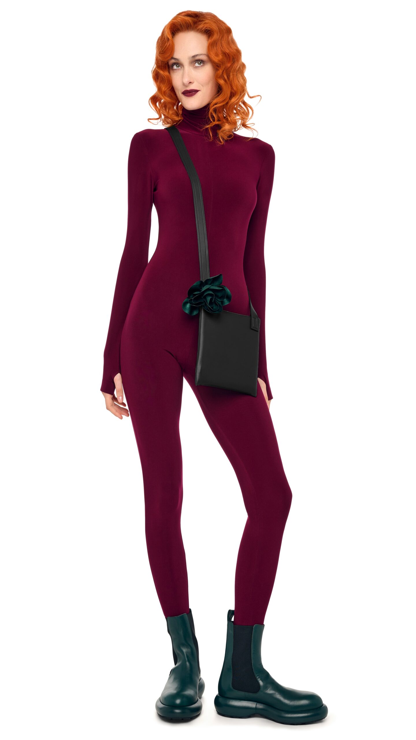 Norma Kamali Long Sleeve Slim Fit Turtle Catsuit W/ Footie | Ready to Wear Collection Luxury Shoes Elevate your elegance in this Norma Kamali from the resort wear edit