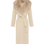 Woman wearing Yves Salomon shearling fur coat – luxury outerwear at Luxury Shoes 