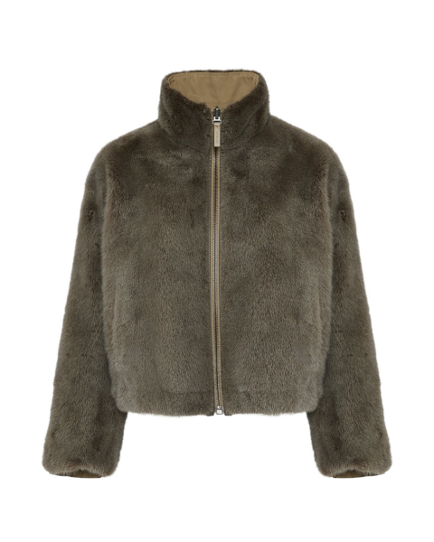 Woman wearing Yves Salomon shearling fur coat – luxury outerwear at Luxury Shoes 