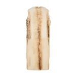 Woman wearing Yves Salomon shearling fur coat – luxury outerwear at Luxury Shoes 