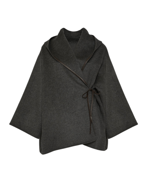Woman wearing Yves Salomon shearling fur coat – luxury outerwear at Luxury Shoes 