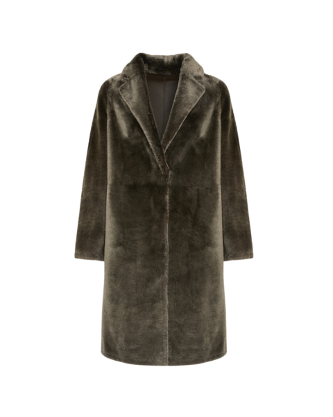 Woman wearing Yves Salomon shearling fur coat – luxury outerwear at Luxury Shoes 
