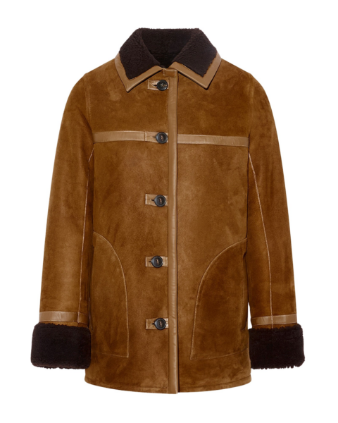 Woman wearing Yves Salomon shearling fur coat – luxury outerwear at Luxury Shoes 