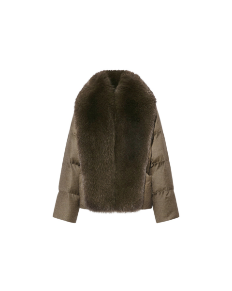 Woman wearing Yves Salomon shearling fur coat – luxury outerwear at Luxury Shoes 
