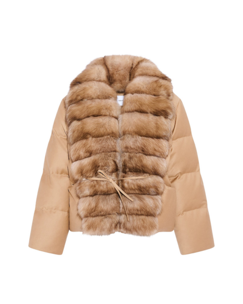 Woman wearing Yves Salomon shearling fur coat – luxury outerwear at Luxury Shoes 