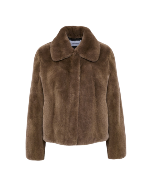 Woman wearing Yves Salomon shearling fur coat – luxury outerwear at Luxury Shoes 