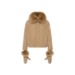 Woman wearing Yves Salomon shearling fur coat – luxury outerwear at Luxury Shoes 
