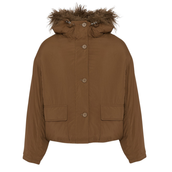Woman wearing Yves Salomon shearling fur coat – luxury outerwear at Luxury Shoes 