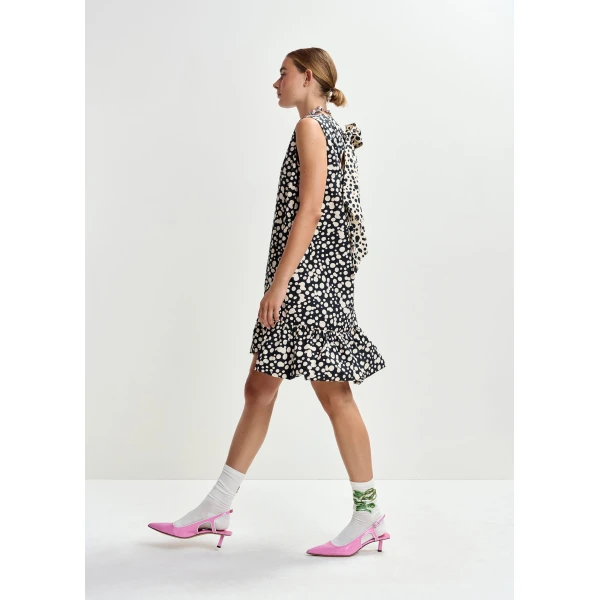 Essentiel Antwerp Black and white ruffled mini dress with open-back and bow detail - Essentiel Antwerp Dresses - Colorful Belgian Design - Shop at Luxury Shoes 