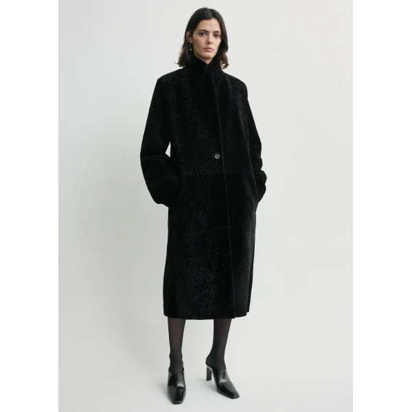 Toteme Coats with minimalist design at Luxury Shoes 