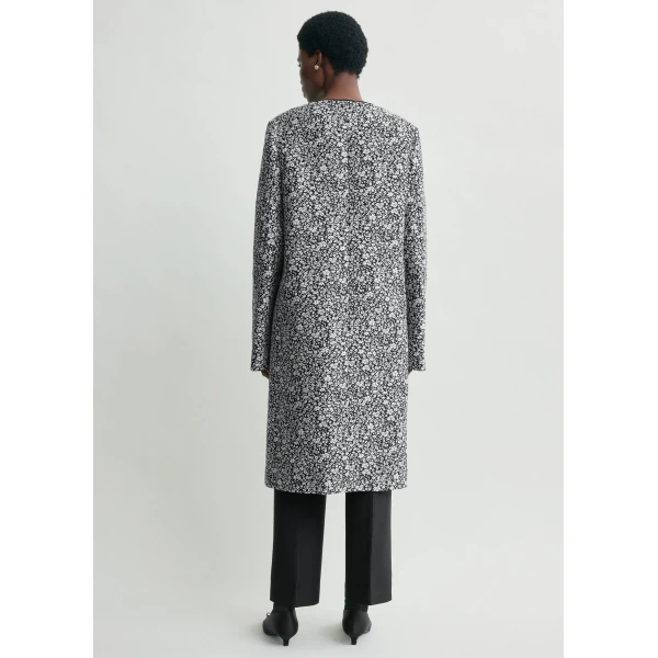 Toteme Coats with minimalist design at Luxury Shoes 