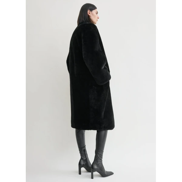 Toteme Coats with minimalist design at Luxury Shoes 