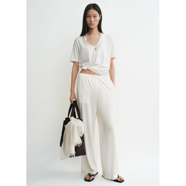 Toteme Loungewear with minimalist design at Luxury Shoes 