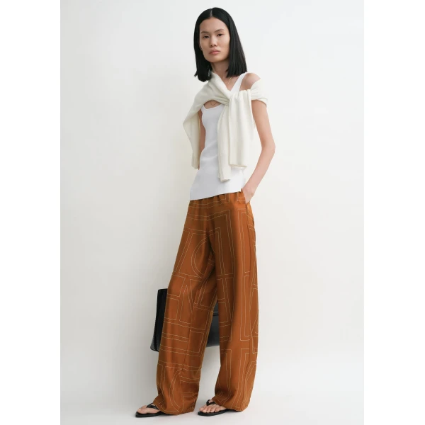 Toteme Loungewear with minimalist design at Luxury Shoes 