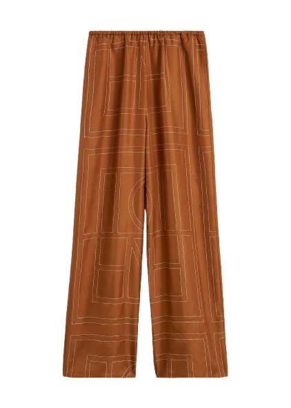 Toteme-Monogram-silk-pj-bottoms-terracotta64557_nobg Toteme Loungewear with minimalist design at Luxury Shoes