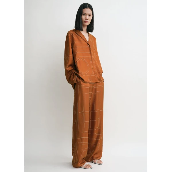 Toteme Tops with minimalist design at Luxury Shoes 