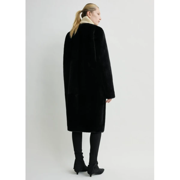 Toteme Coats with minimalist design at Luxury Shoes 