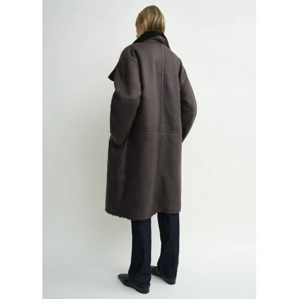Toteme Coats with minimalist design at Luxury Shoes 