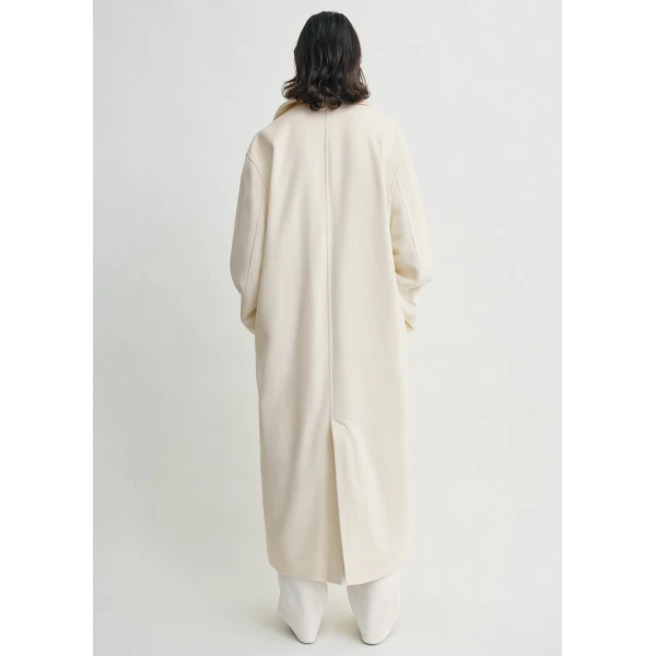 Toteme Coats with minimalist design at Luxury Shoes 