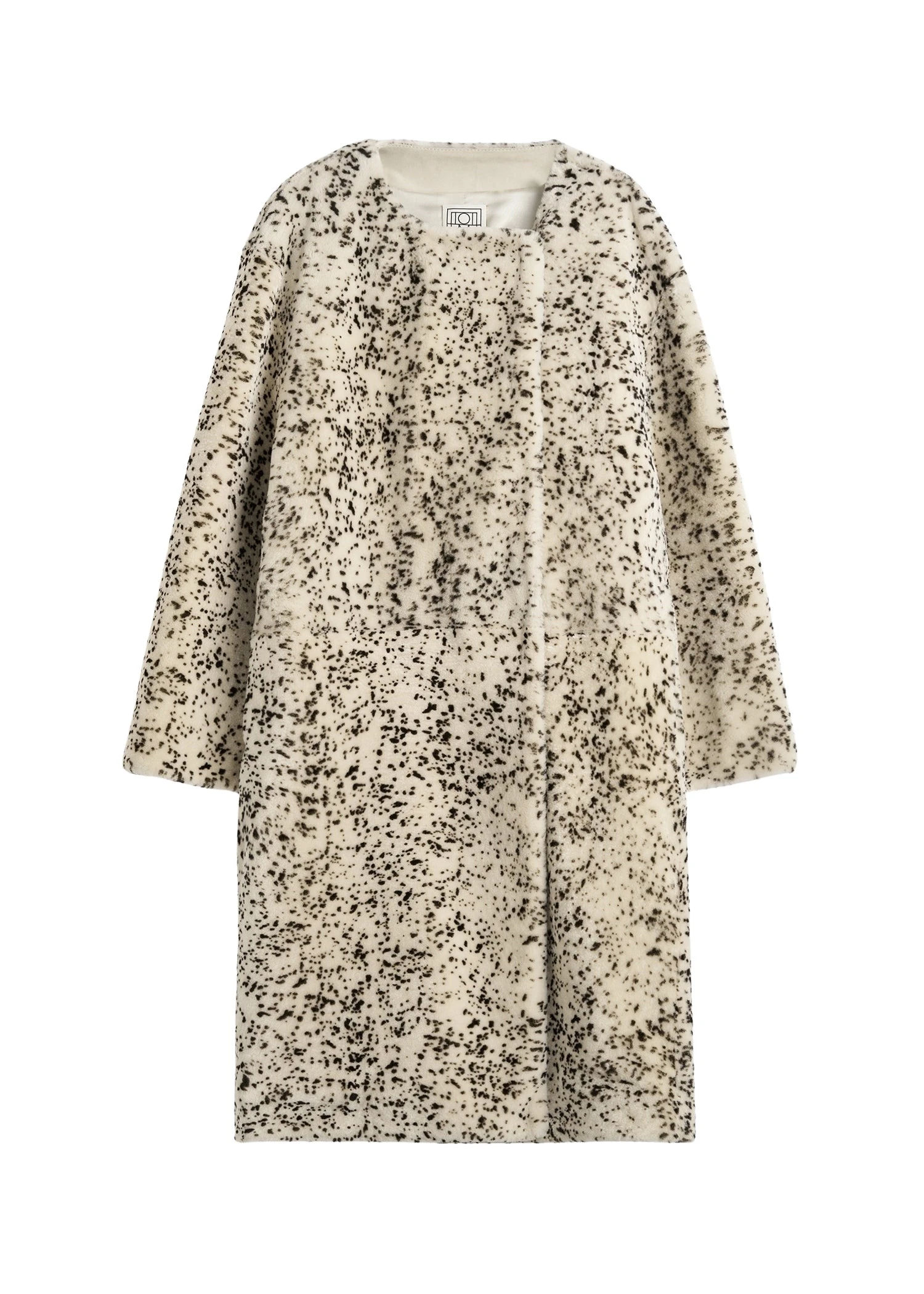 Toteme-Stracciatella-shearling-coat-blackwhite97026_nobg Toteme Coats with minimalist design at Luxury Shoes