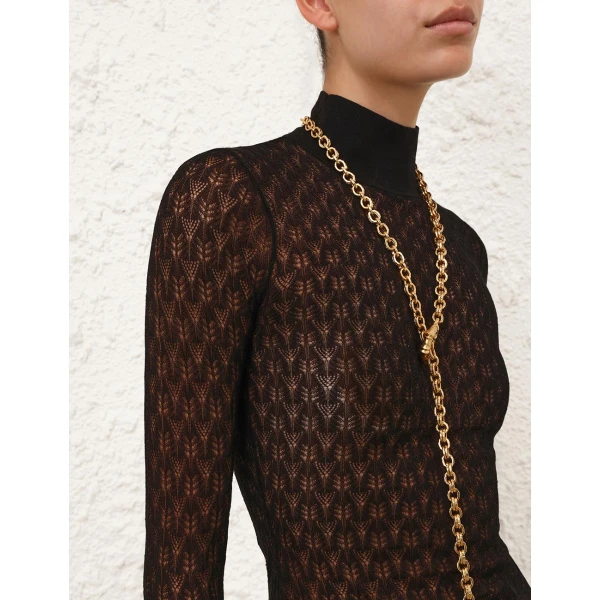 Elevate your elegance in this Zimmermann Knitwear   from the 2025 resort wear edit