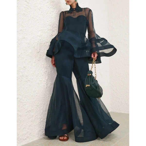 Elevate your elegance in this Zimmermann Tops   from the 2025 resort wear edit
