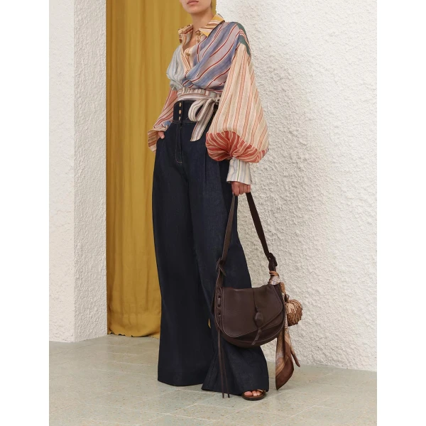 Elevate your elegance in this Zimmermann Tops   from the 2025 resort wear edit