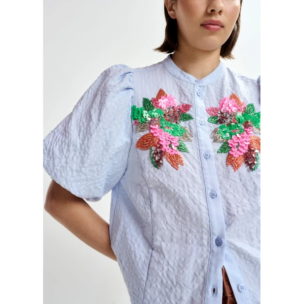 Essentiel Antwerp Light blue and multicolor floral sequin and bead-embellished shirt with voluminous sleeves - Essentiel Antwerp Shirts - Colorful Belgian Design - Shop at Luxury Shoes 